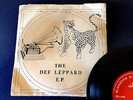 THE DEF LEPPARD EP with Sleeve signed  RED LABEL Very Rare 33 1/3 rpm