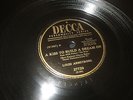 78RPM Decca Louis Armstrong, A Kiss to Build Dream On/ I Get Ideas high grade E