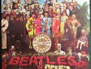 BEATLES  LP  SGT PEPPERS  WITH CUT OUT INSERT  MID 70'S Purple lbl.