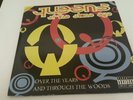 Queens of the Stone Age-Over the Years And Through The Woods