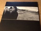 U2. THE JOSHUA TREE.  NEAR MINT VINYL WITH LYRIC POSTER