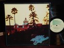THE EAGLES 1976 Vinyl LP HOTEL CALIFORNIA *NEAR MINT STERLING MASTERED w/ POSTER