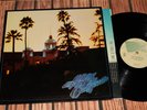THE EAGLES   HOTEL CALIFORNIA LP   NEAR MINT ORIGINAL PRESS WITH POSTER