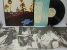 THE EAGLES nr mint vinyl lp HOTEL CALIFORNIA with poster