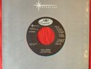 JOHN LENNON STAND BY ME - WOMAN IS THE  7
