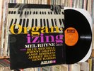 MEL RHYNE 