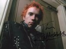 AUTHENTIC JOHNNY ROTTEN SIGNED 10 X 8 SEX PISTOLS PHOTO...REAL SIGNATURE...COA