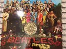 The Beatles Sgt Pepper LP with cutouts. Recent Price Reduction