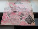 CARAVAN IN THE LAND OF GREY AND PINK DERAM BROWN AND WHITE LABELS