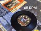 45RPM SINGLE JOHN LENNON / YOKO ONO WOMAN IS THE N----- OF THE WORLD / SISTERS O