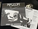 RAZOR- Armed And Dangerous CAN IMP. BLACK VINYL official re-release THRASH CLASS
