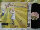 Genesis m- pink hatter in shrink LP Nursery Cryme