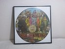 The Beatles “Sgt. Pepper’s Lonely Hearts Club Band” LP Picture Disc with frame