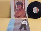 LUIS MIGUEL. BUSCA UNA MUJER.  RECORD VG+ . COVER VG+. SHRINK INSERT