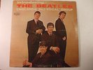 Introducing The Beatles VJ 1062 Version 2 Mono cover has white paperboard inside