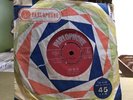 UK original of The Beatles: Love me do, on red Parlophone: made in GB on label.