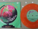 X ray spex-The world turned day glo. Orange vinyl