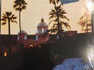 EAGLES HOTEL CALIFORNIA EARLY HOLE PUNCH PROMO LP UNPLAYED STILL IN SHRINK MINTY