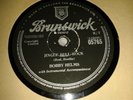 BOBBY HELMS : JINGLE BELL ROCK / CAPTAIN SANTA CLAUS.  UK.78rpm (1958)