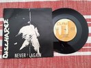 Discharge - Never Again 7