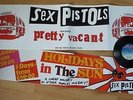 thE SEX PiSTOLs HoLidAys iN tHe SuN & PrETTy  VACanT posTEr  sEDITIONAries 1977