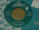 CHRISTMAS 45,  HOLLY TWINS.  I WANT ELVIS FOR XMAS  /  THE TENDER AGE.