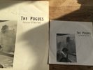 The pogues fairytale of New York City 12in vinyl and 7in record there is a stamp