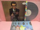JAPAN LP PROMO WHITE ELVIS COSTELLO ATTRACTIONS THIS YEAR'S MODEL P10538F INSERT