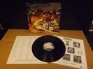 tom petty and the heartbreakers into the great wide open lp plays excellent