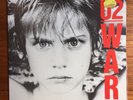 U2 WAR   plus 3 x bonus singles Pride, New Years Day & Two Hearts Beat as One