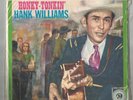 Hank Williams on MGM 1318-EP-PS- My Bucket's Got A Hole In It/Baby, We're Really