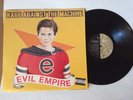 RAGE AGAINST THE MACHINE lp EVIL EMPIRE epic E 57523 MINT/ EX+ 1st PRESSING