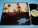 THE EAGLES   HOTEL CALIFORNIA LP NEAR MINT ORIGINAL PRESS WITH POSTER