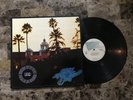 THE  EAGLES HOTEL CALIFORNIA RARE DJ PROMO WITH POSTER INSERT STERLING PRESS LP