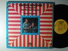 TOMMY OLIVENCIA con CHAMACO RAMIREZ Plante Bandera LATIN LP Shrink INCA