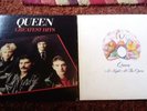 Queen A Night at the Opera and Queen Greatest Hits vinyl albums.