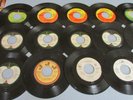 Beatles and other collectible 45 rpm records with list of 21 records $1 each