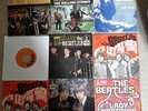 beatles records. singles and stone and animals