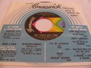 THE YOUNG HOLT TRIO-AIN'T THERE SOMETHING THAT MONEY CAN'T BUY/MELLOW-BRUNSWICK