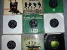 A COLLECTON OF BEATLES SINGLES AND EP'S