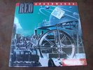 Vintage REO Speedwagon- Wheels are Turning Vinyl LP Record Album (1984) SEALED