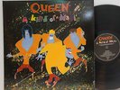 Queen         A kind of magic        Gat        M # L