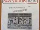 THE THOMAS GROUP 