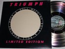 LP TRIUMPH - ROCK & ROLL MACHINE LIMITED EDITION  SILVER VINYL  CA-ORG 1977 MINT