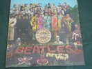 Sgt. PEPPERS LONELY HEARTS CLUB BAND  PMC 7027  (1967) with cutouts card.