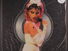MADONNA: Angel / Burning Up 12 (UK, shaped pic disc in PVC sleeve.  Sleeve has