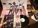 Prince And The Revolution Purple Rain LP Near Mint vinyl with Poster Inner sleev