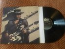 NEAR MINT ?  STEVIE RAY VAUGHN ? TEXAS FLOOD  LP ? Epic * VINYL & SLEEVE NM