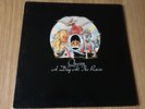 QUEEN - A DAY AT THE RACES.  1976 LP RECORD WITH ORIGINAL INNER