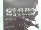 Tamam Shud - Eight Years of Moonlight. Signed on front by whole band  Surf Oz.